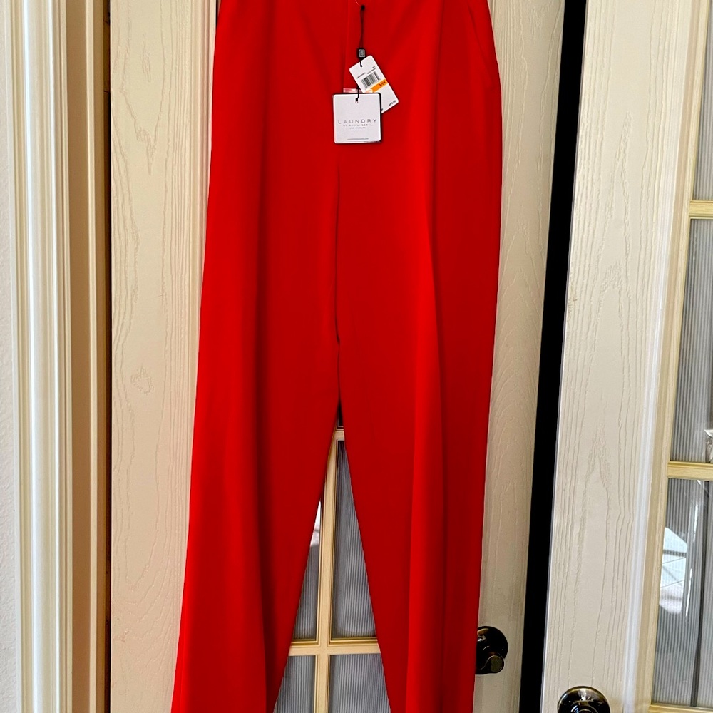 Sz sm, red pants, zip front, elastic back. 32” inseam crepe mat fully lined.